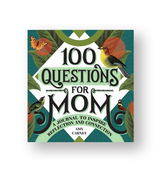 Cover of 100 Questions for Mom: A Journal to Inspire Reflection and Conversation by Amy Carney features a bird and leaf motif in a green border around a white diamond-shaped title block
