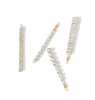 Gold-toned bobby pins with clear rhinestone accents in different sizes, styles, and juxtapositions