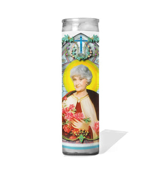 Tall glass prayer candle with label illustration depicting Golden Girls character Dorothy Zbornak as a saint