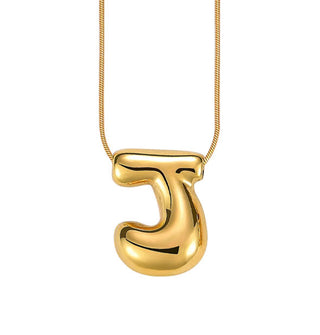 Gold bubble letter "J" pendant on gold cable chain