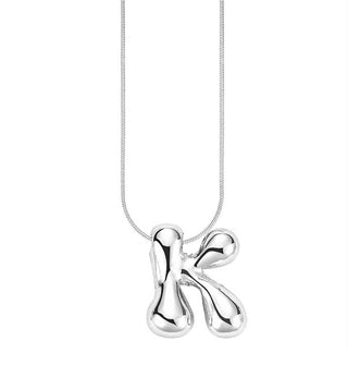 Silver bubble letter "K" pendant on silver cable chain