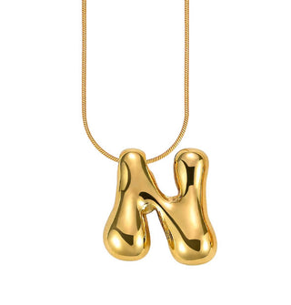 Gold bubble letter "N" pendant on gold cable chain