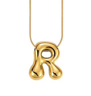 Gold bubble letter "R" pendant on gold cable chain