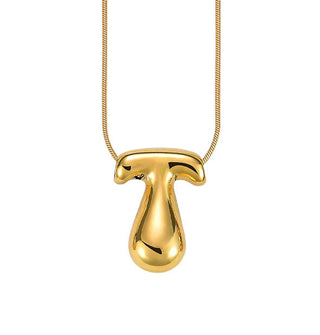 Gold bubble letter "T" pendant on gold cable chain
