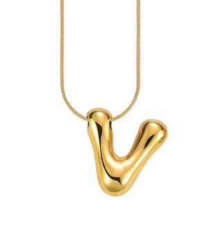 Gold bubble letter "V" pendant on gold cable chain