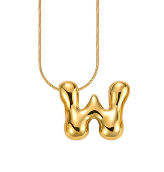 Gold bubble letter "W" pendant on gold cable chain
