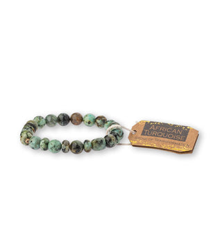 African turquoise stone bead bracelet with brown tag attached