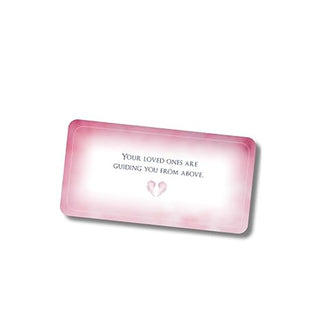 Rectangular pink card says, "Your loved ones are guiding you from above."