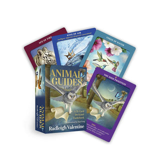 Box and four-card spread of Animal Guides Tarot cards by Radleigh Valentine