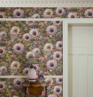 Large floral print wallpaper in a room with white trim