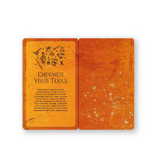 Front and back of an orange sample card from the Art Magick deck says, "Empower Your Tools" with speckled accents and small illustration in black