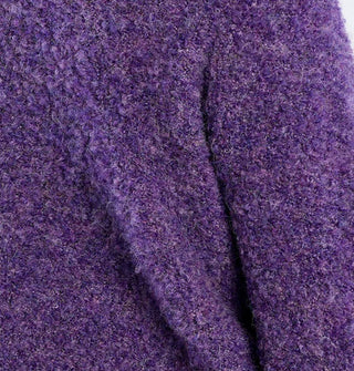 Closeup of purple bouclé knit