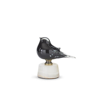 Small flecked black glass bird figurine affixed to a marble base with metal hardware