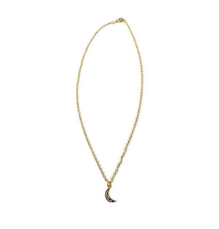 Black crescent moon pendant with small crystals on a gold chain