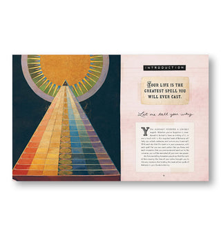Page spread from Bohemian Magick features the introduction with a quote, "Your life is the greatest spell you will ever cast" alongside a prismatic pyramid and sun illustration