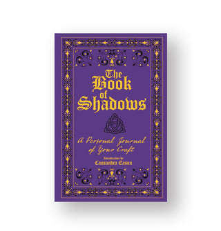 Purple cover of The Book of Shadows: A Personal Journal of Your Craft by Cassandra Eason features black and gold design and type details
