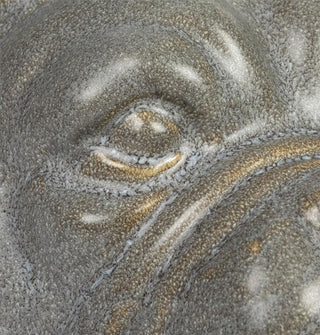 Closeup of the eye on a French bulldog head vase