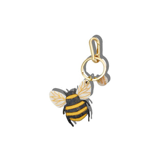 Yellow and black-striped bumblebee charm with gold-accented wings hangs from a gold keyring with tab and lobster clasp attached