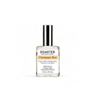 Silver-capped clear square 1 ounce glass bottle of Demeter Fragrance Library Pick-Me-Up Cologne Spray in Champagne Brut scent