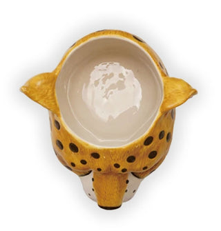 Ceramic cheetah head planter shown from the top