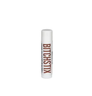 White tube of Bitchstix lip balm with large brown lettering