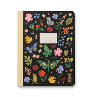 Black notebook with rounded corners and gold binding features colorful plant and insect illustrations