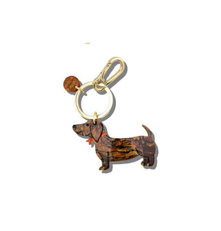 Brown dachshund charm hangs from a gold keyring with tab and lobster clasp attached
