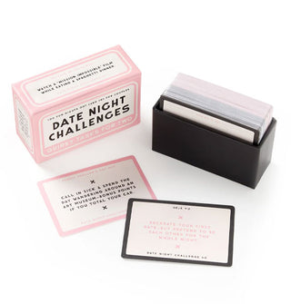 An opened Date Night Challenges game box with two sample cards drawn