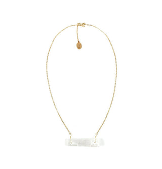Wide rectangular selenite stone is strung at both ends from gold chain with an oval charm hanging from its clasp