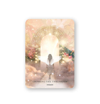The Crossing the Threshold card from the Divine Feminine Archangel Oracle deck features ethereal image of a winged figure walking through a brightly lit doorway between clouds, moon phases, and floral impressions, and symbolizes intuition