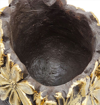 Opening of a rustic brown planter pot with metallic gold flower detail on the outside rim