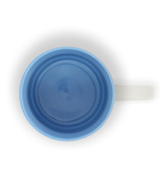 Top view of coffee mug reveals a blue interior