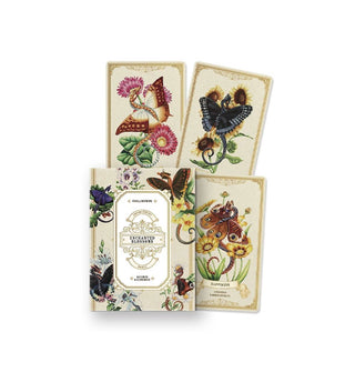 Box and sample cards from the Enchanted Blossoms Oracle deck by Carla Morrow featuring Victorian-inspired floral and butterfly artwork
