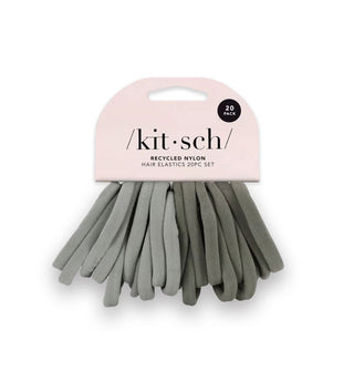 Collection of 20 light green and dark green Recycled Nylon Hair Elastics by Kitsch on light pink product card
