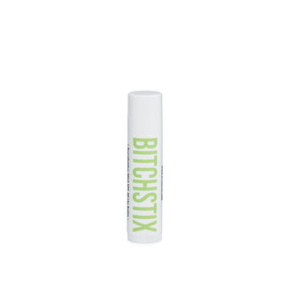 White tube of Bitchstix lip balm with large light green lettering