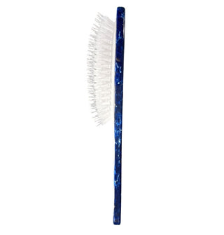 Hairbrush side view shows combo bristles