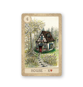 House (king of hearts) card from the Fairy Tale Lenormand deck features illustration of a Tudor-style cottage with cobblestone path in a forest clearing