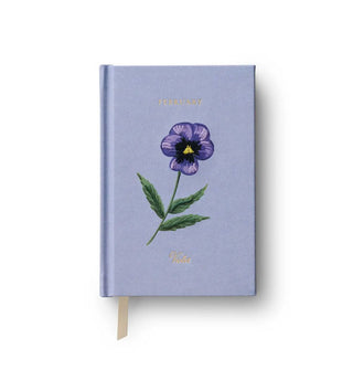 Blue notebook hardcover features embroidered violet design and says, "Violet" beneath it in gold script and "February" at the top in gold print
