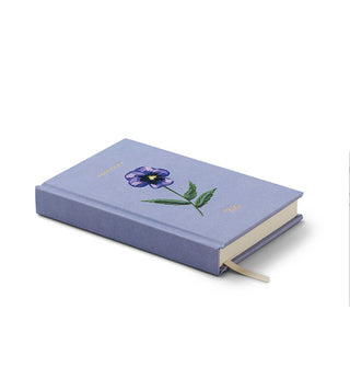Three-quarter view of the February mini hardcover notebook with violet embroidery