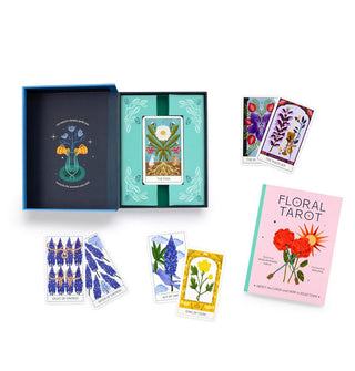 Contents from the Floral Tarot kit: box, sample cards, and guidebook