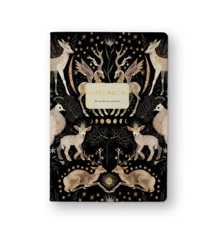 Black notebook cover features illustrations of animals like deer, lambs, and peacocks in a white, gray, and beige color palette and surrounded by celestial symbols