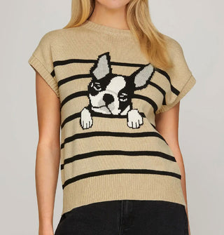 Model wears a light brown cap-sleeved sweater with black stripes, between which a black and white French bulldog graphic emerges