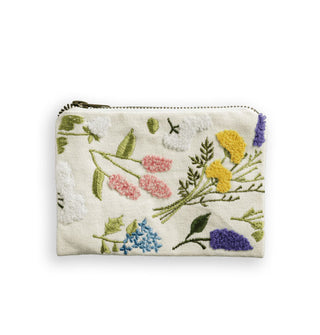 White cotton zippered pouch with colorful embroidered floral designs