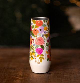 Thermal flute by Rifle Paper Co. and Corkcicle features a stainless steel interior and white exterior accented by a colorful floral design