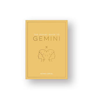 Yellow cover of The Zodiac Guide to Gemini by Astrid Carvel features white and gold lettering and a central illustration of to faces in profile view facing away from one another