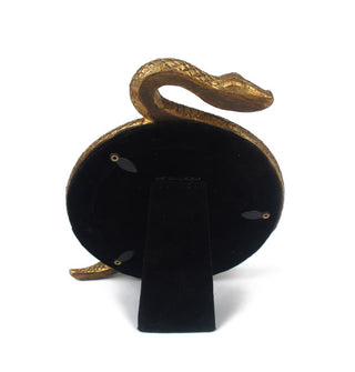 Black back of gold snake fame shows three swivel clips and easel support