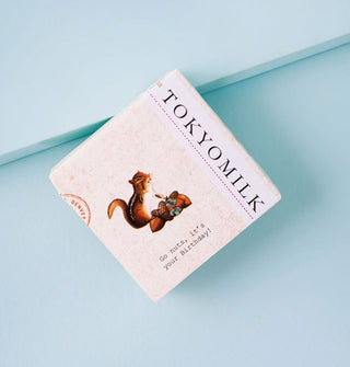 Square wrapped bar of TokyoMilk soap features illustration of a chipmunk with acorns and says, "Go nuts, it's your Birthday!"