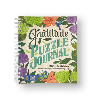Cover of spiral-bound Gratitude Puzzle Journal features a colorful border of flowers accented with a hummingbird and butterfly