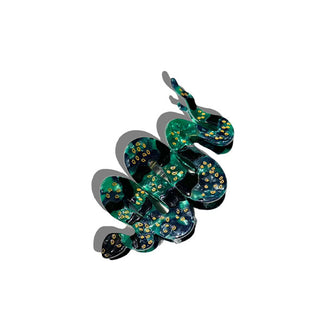 Green hair clip designed as a snake with gold spots