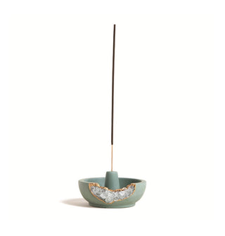 Round green incense stick holder with gold foil-trimmed clear quartz cutout